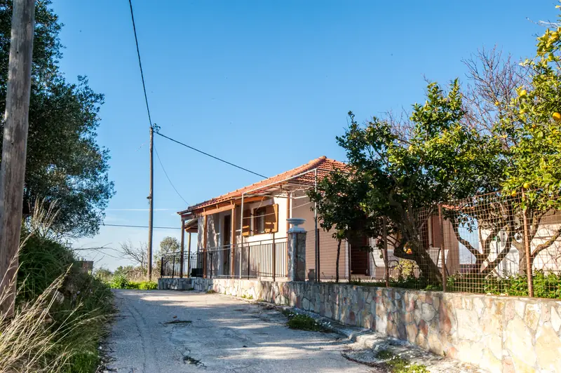 The house and the lane running past it