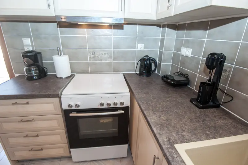 The kitchen, with the door out to the veranda