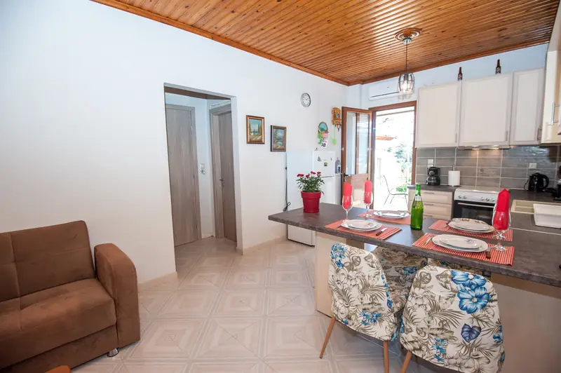 The living room, with the veranda door beyond