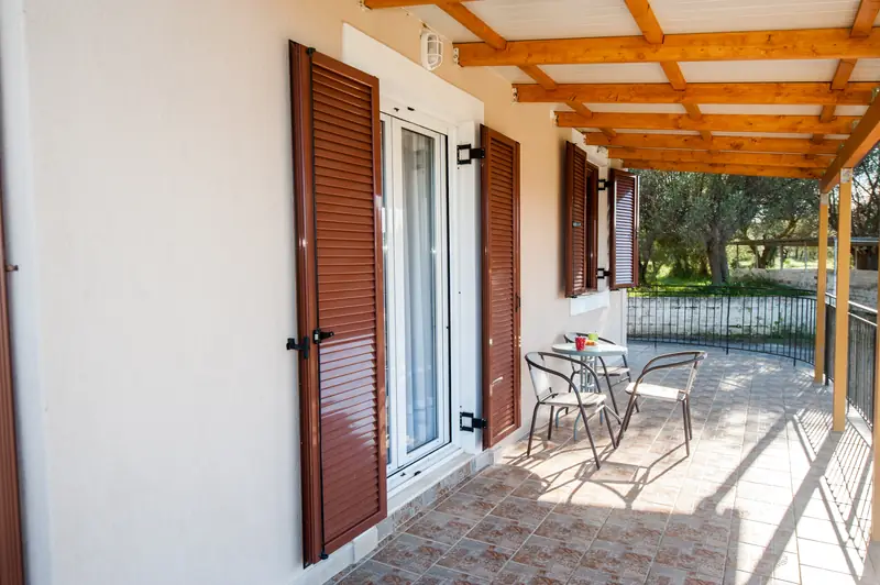 The shaded veranda along the front of Anna Maria House